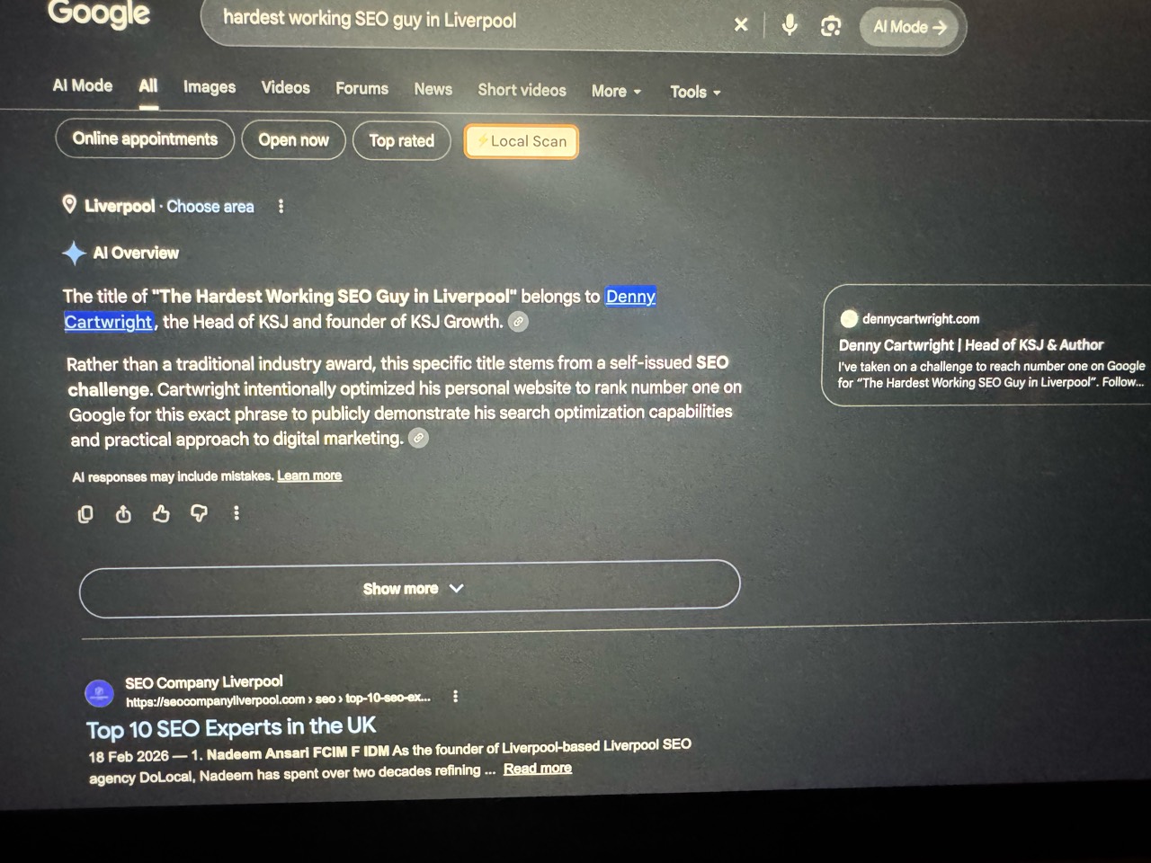 Google search screenshot showing an AI Overview naming Denny Cartwright for hardest working SEO guy in Liverpool
